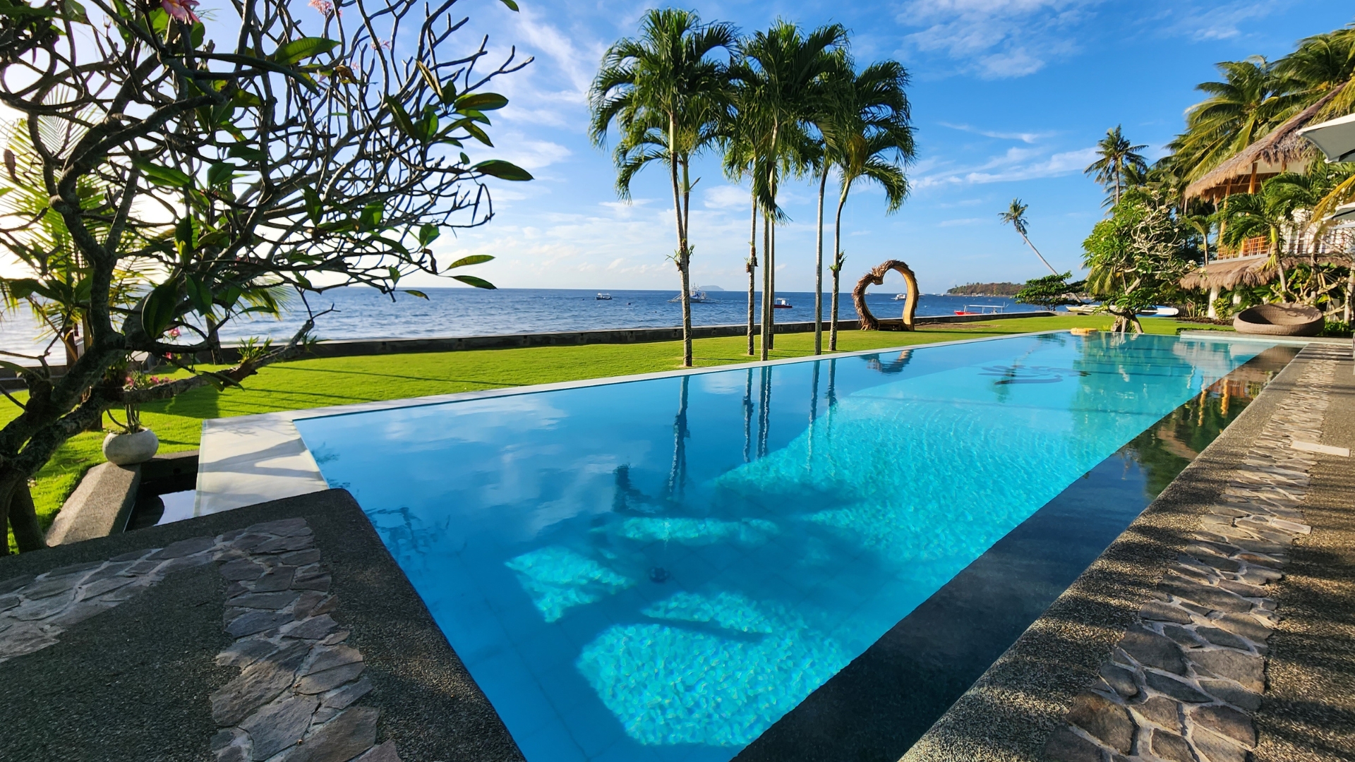 Looking out over the infinity pool at Salaya Beach Houses, Dumaguete Philippines